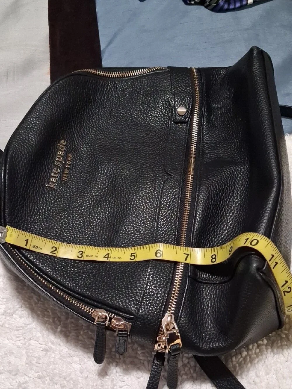 kate spade black pebbled leather backpack with gold hardware